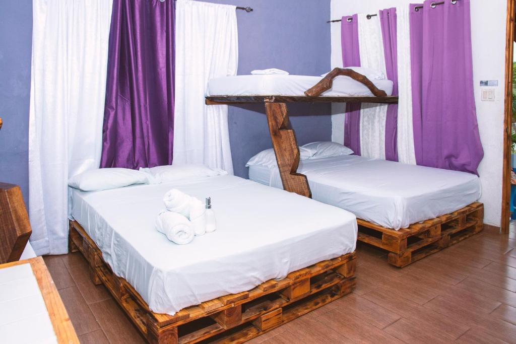 Voodi või voodid majutusasutuse HOSPEDAJE VILLAMAR toas