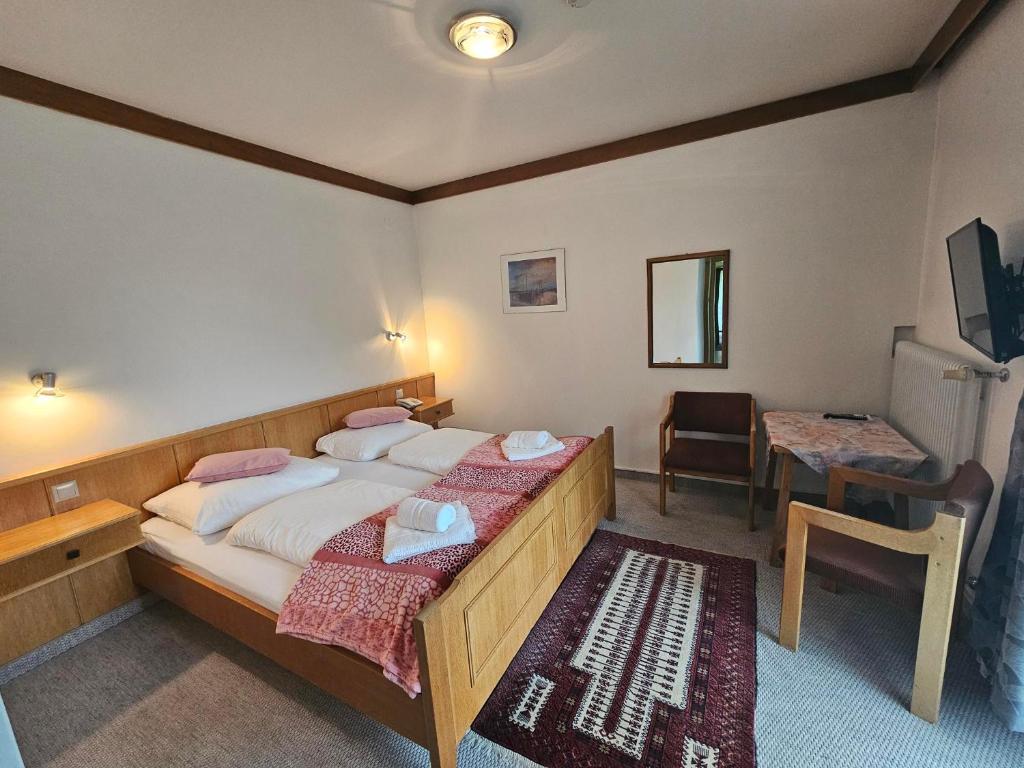 Łóżko lub łóżka w pokoju w obiekcie Apartments Edenhof