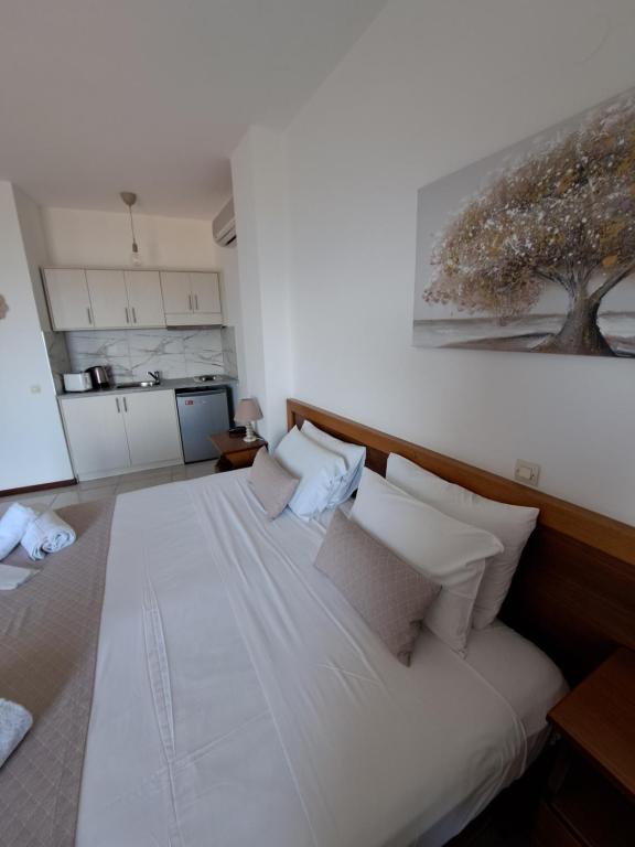 A bed or beds in a room at 75 Steps Apartments