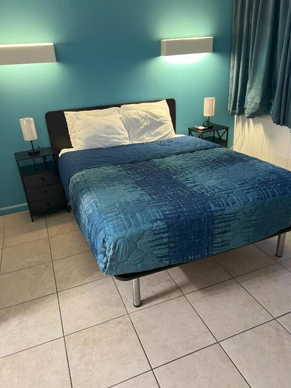 Postel nebo postele na pokoji v ubytování AIRE Hotel North Beach Jersey Shore
