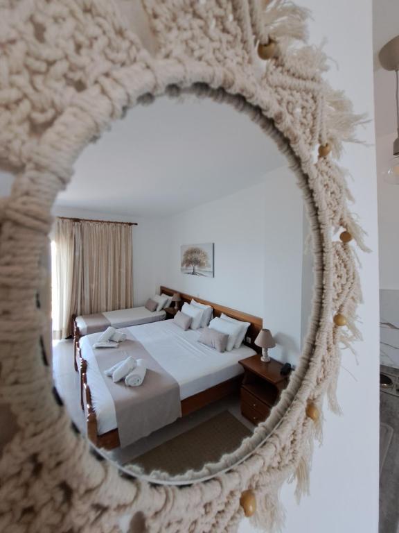 A bed or beds in a room at 75 Steps Apartments
