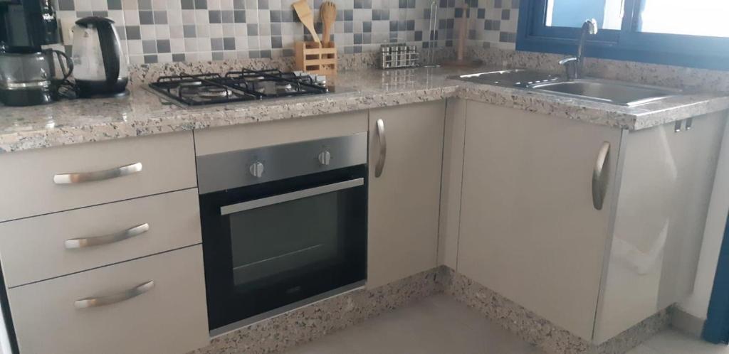 Kuchyň nebo kuchyňský kout v ubytování Appartement de Luxe Costa-Mar Martil Tetouan