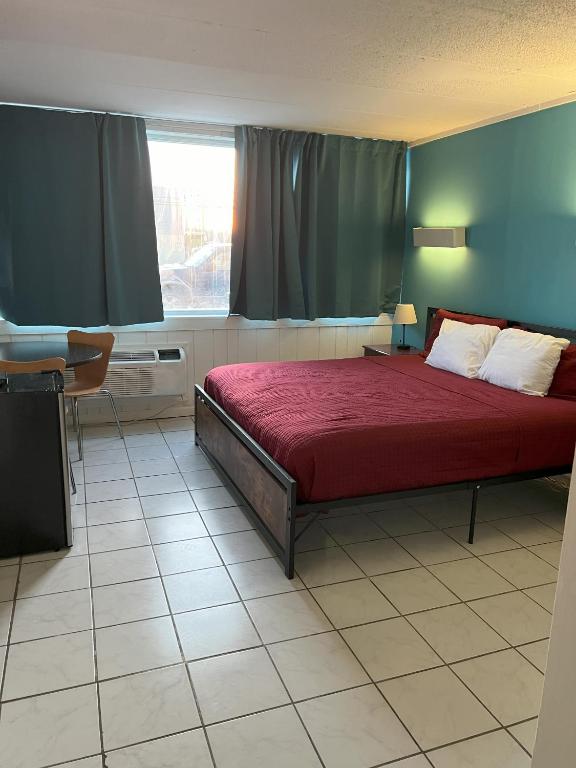 Postel nebo postele na pokoji v ubytování AIRE Hotel North Beach Jersey Shore