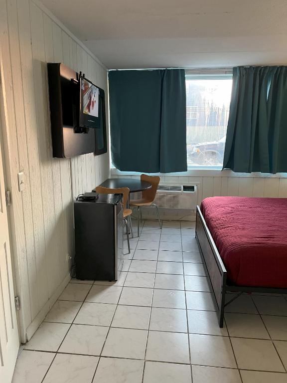 Postel nebo postele na pokoji v ubytování AIRE Hotel North Beach Jersey Shore