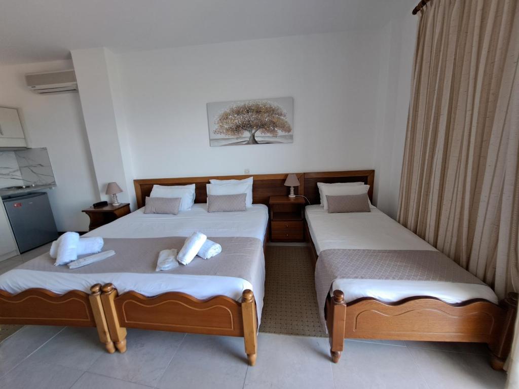 A bed or beds in a room at 75 Steps Apartments
