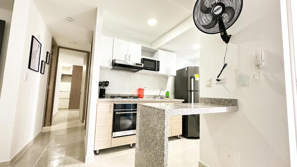 Eldhús eða eldhúskrókur á Apartamentos en Club Residencial