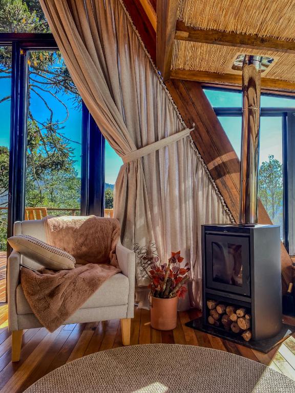 Χώρος καθιστικού στο Chalé de luxo nas montanhas - Urubici