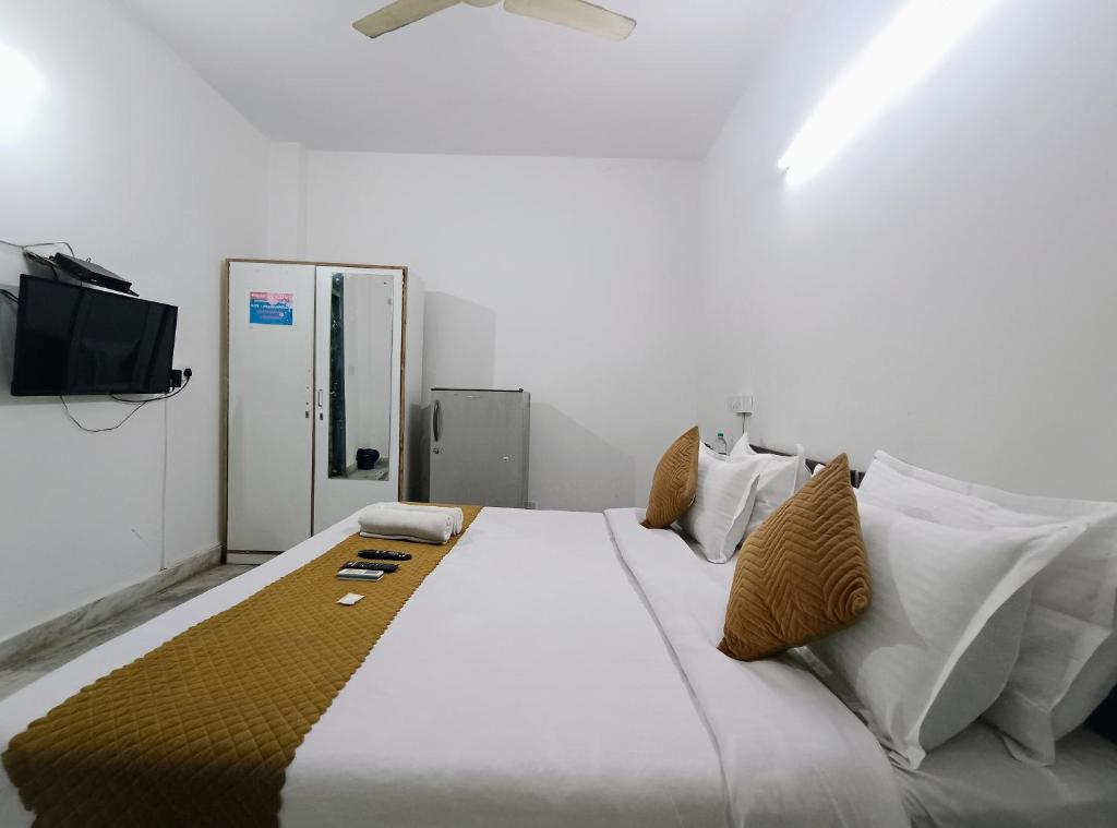 Postel nebo postele na pokoji v ubytování Hotel Hauz Khas Fort View