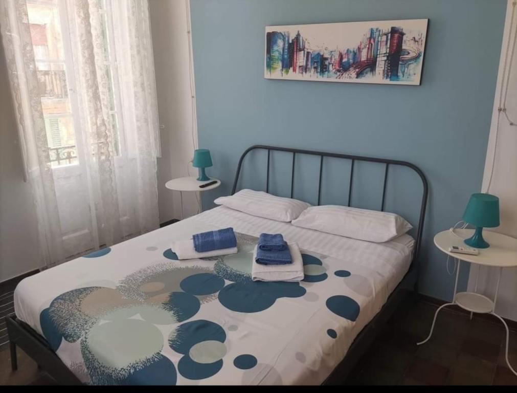 Postel nebo postele na pokoji v ubytování La Mulasciara, Scilla