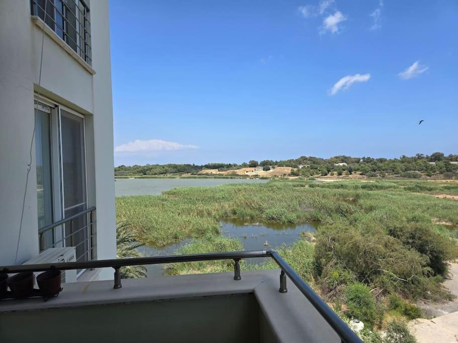 a view of a river from the balcony of a house at Lake View Apartment in Famagusta in Mağusa