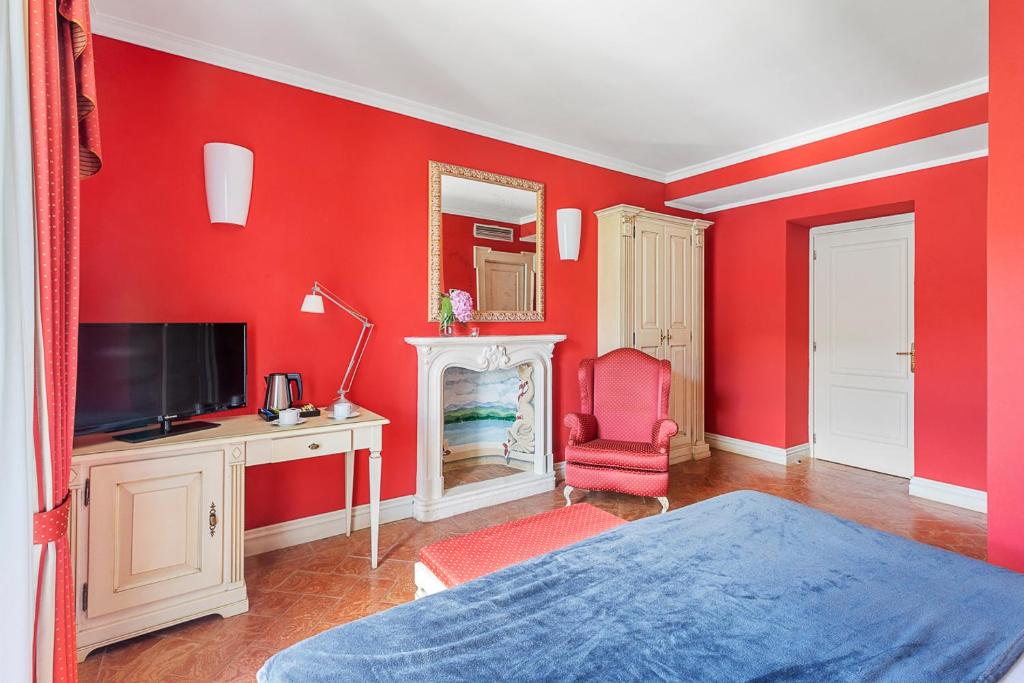 TV a/nebo společenská místnost v ubytování Hotel Cannobio