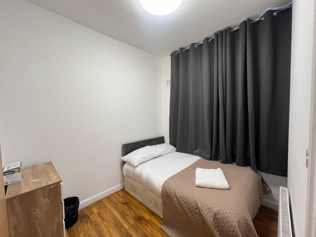 Postel nebo postele na pokoji v ubytování World Hotel