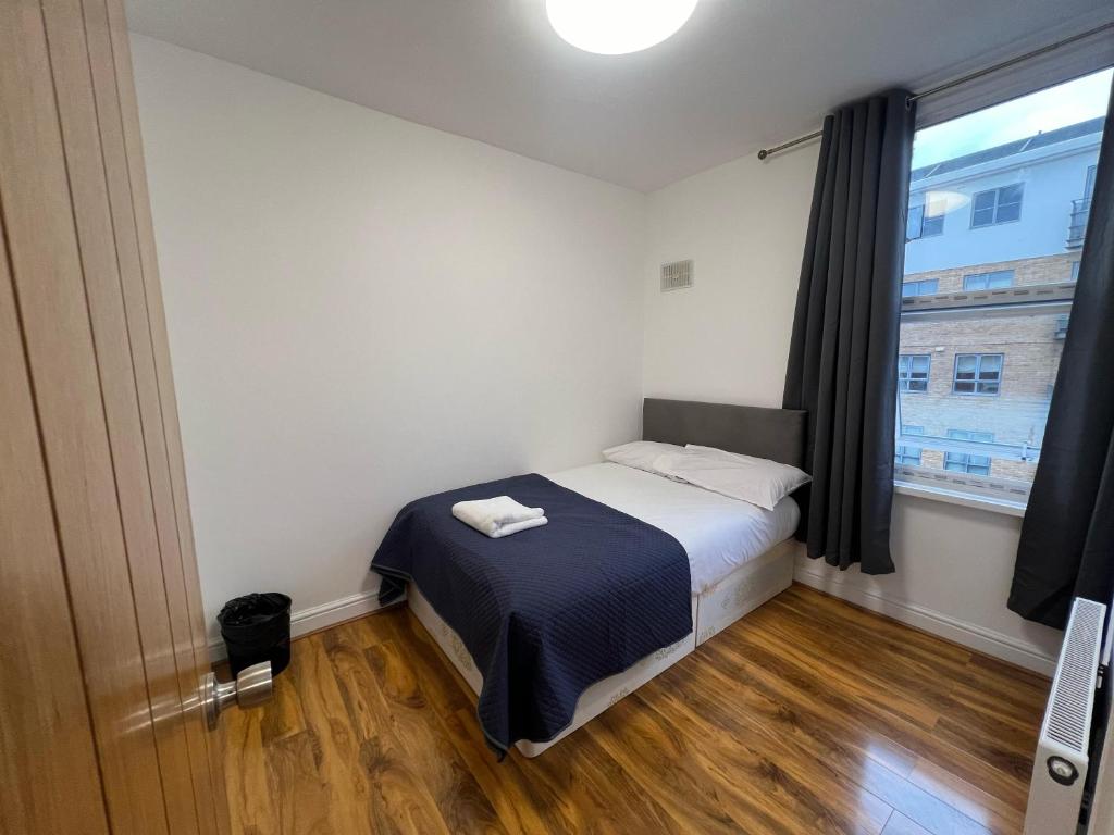 Postel nebo postele na pokoji v ubytování World Hotel