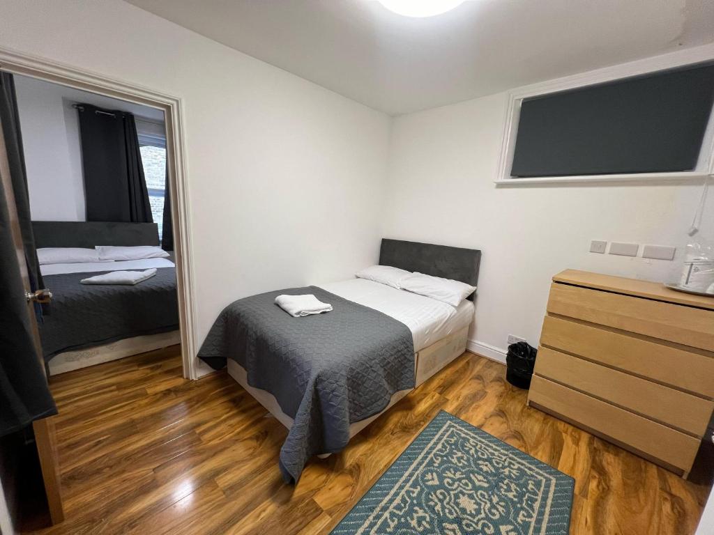 Postel nebo postele na pokoji v ubytování World Hotel
