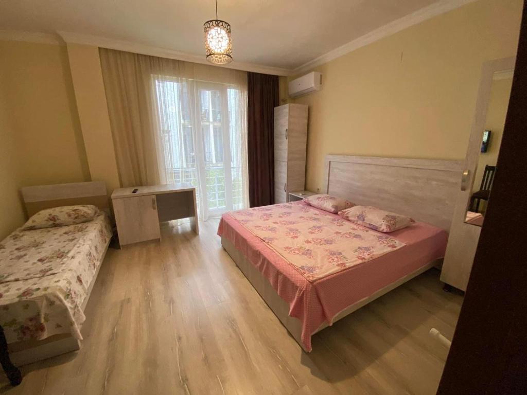 Postel nebo postele na pokoji v ubytování White Room