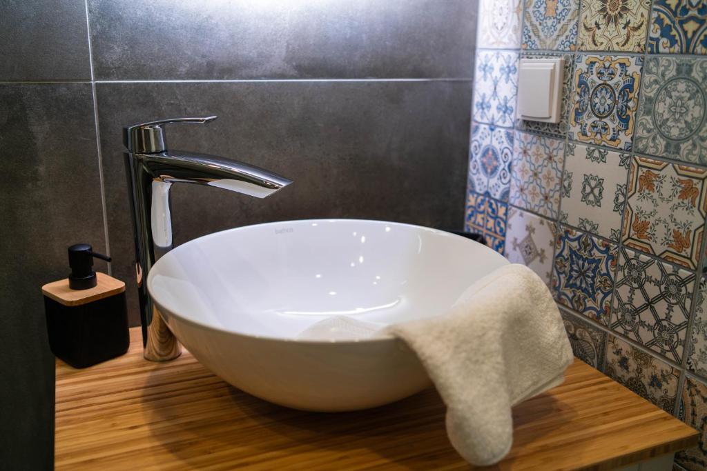 A bathroom at Apartment in the Heart of the Top Center