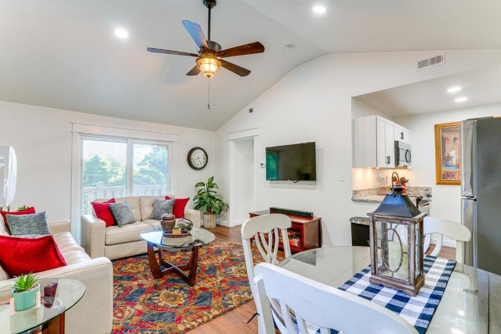 a kitchen and living room with a ceiling fan at East Tennessee Home about 23 Mi to Chattanooga! in Cleveland