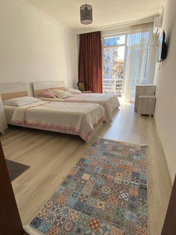 Postel nebo postele na pokoji v ubytování White Room