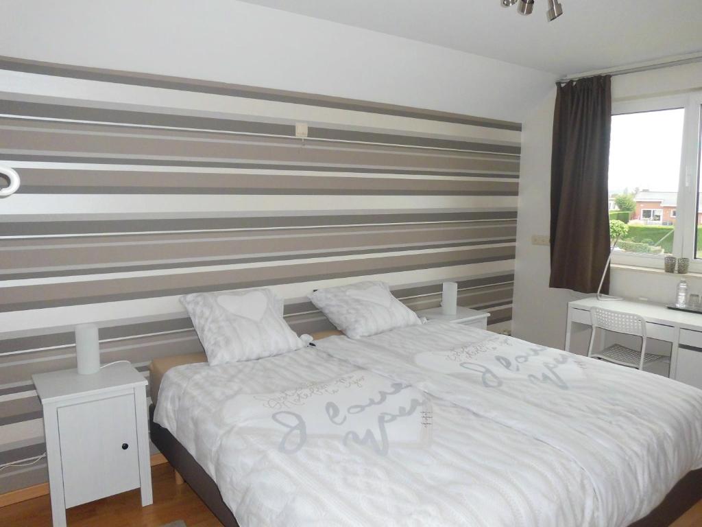 Postel nebo postele na pokoji v ubytování Chez Paul