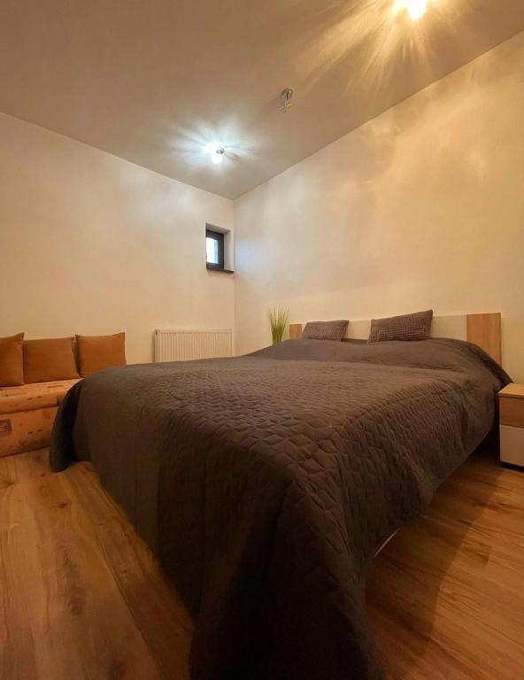 Postel nebo postele na pokoji v ubytování Apartmány IVETA