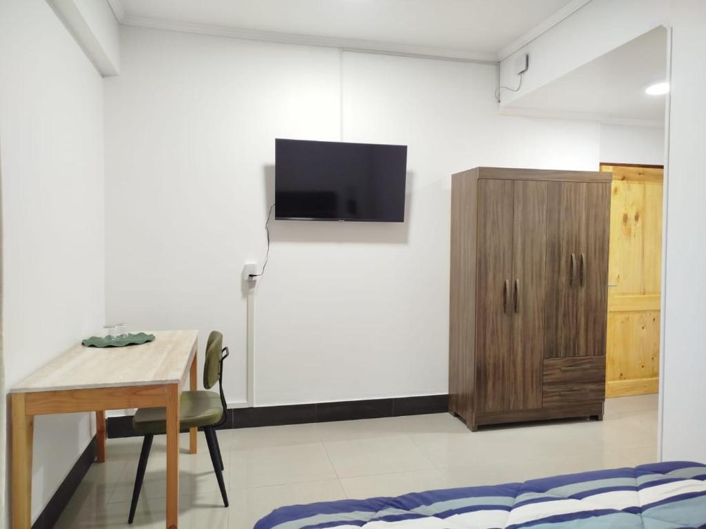 TV a/nebo společenská místnost v ubytování Hotel Ming Shen