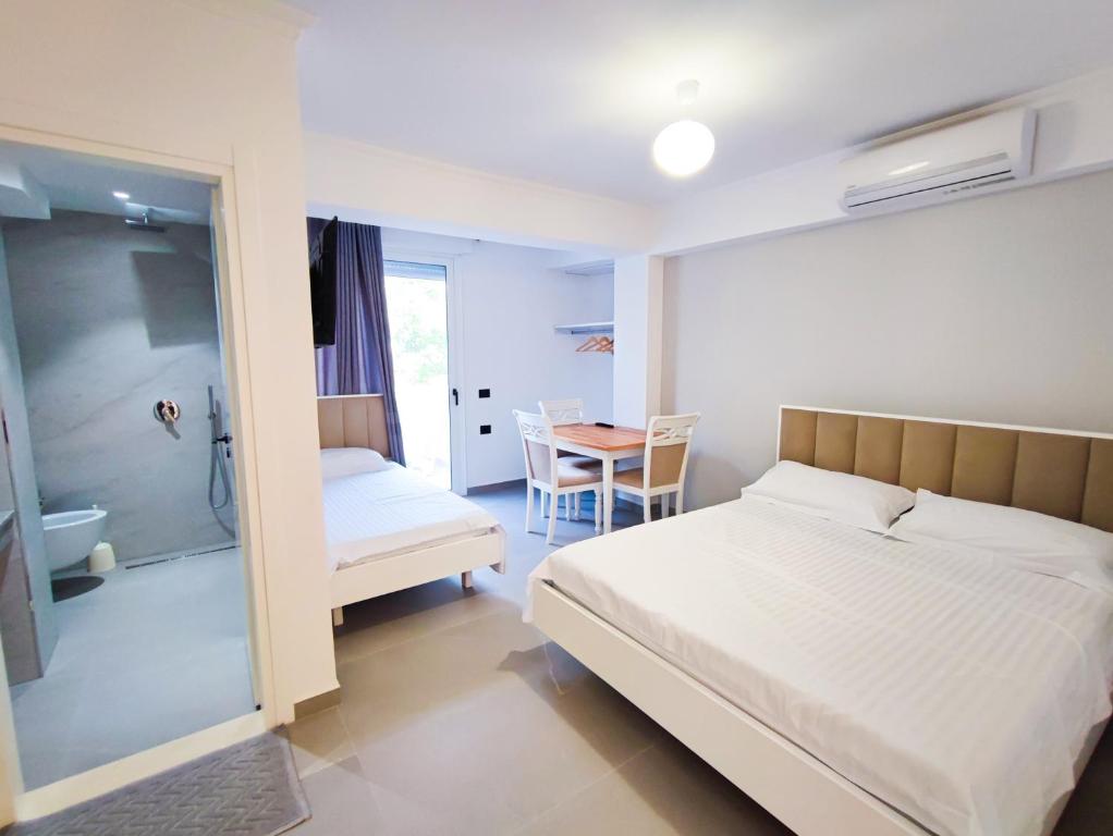 Postel nebo postele na pokoji v ubytování Comfort Villa
