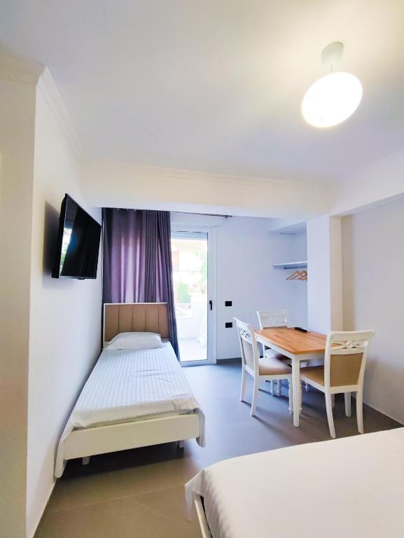 Postel nebo postele na pokoji v ubytování Comfort Villa