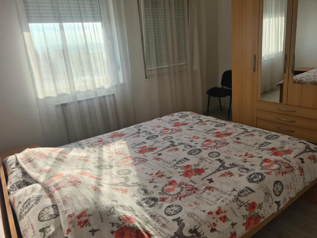 Postel nebo postele na pokoji v ubytování Apartmani Loznica