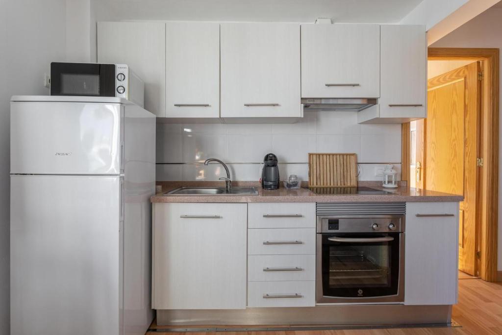 Kuchyňa alebo kuchynka v ubytovaní Apartamento en Urbanizacíon Residencial
