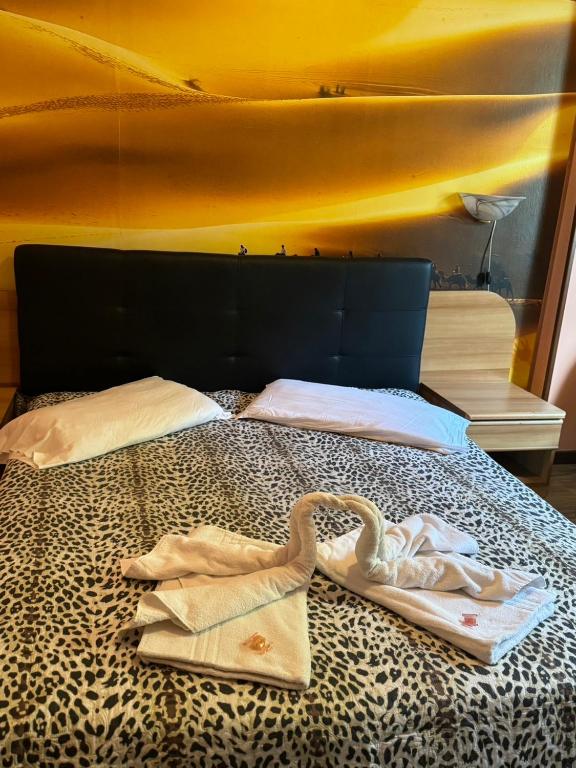 Postel nebo postele na pokoji v ubytování sleep well hotel total 2 stelle