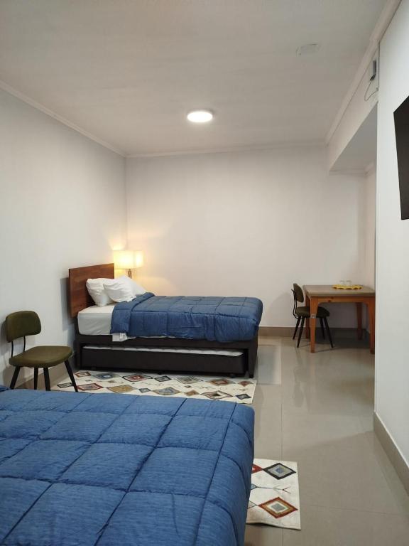 Postel nebo postele na pokoji v ubytování Hotel Ming Shen