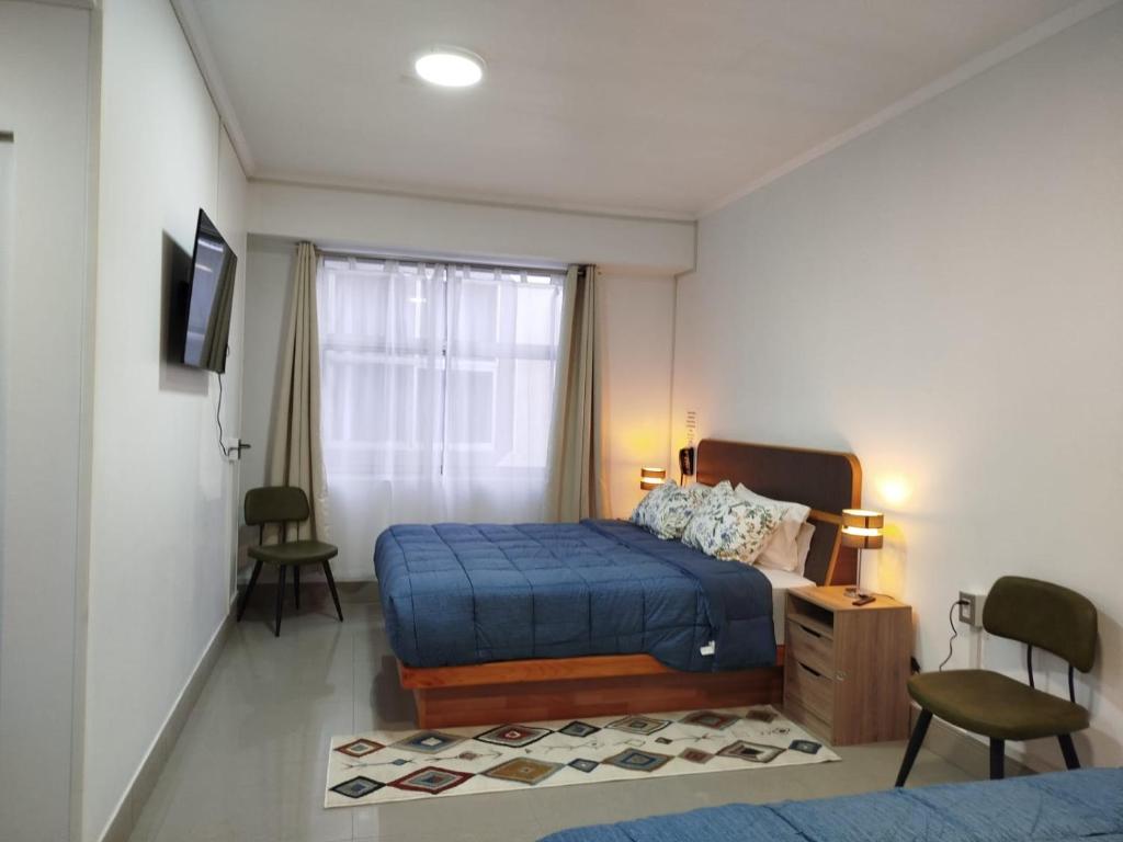 Postel nebo postele na pokoji v ubytování Hotel Ming Shen