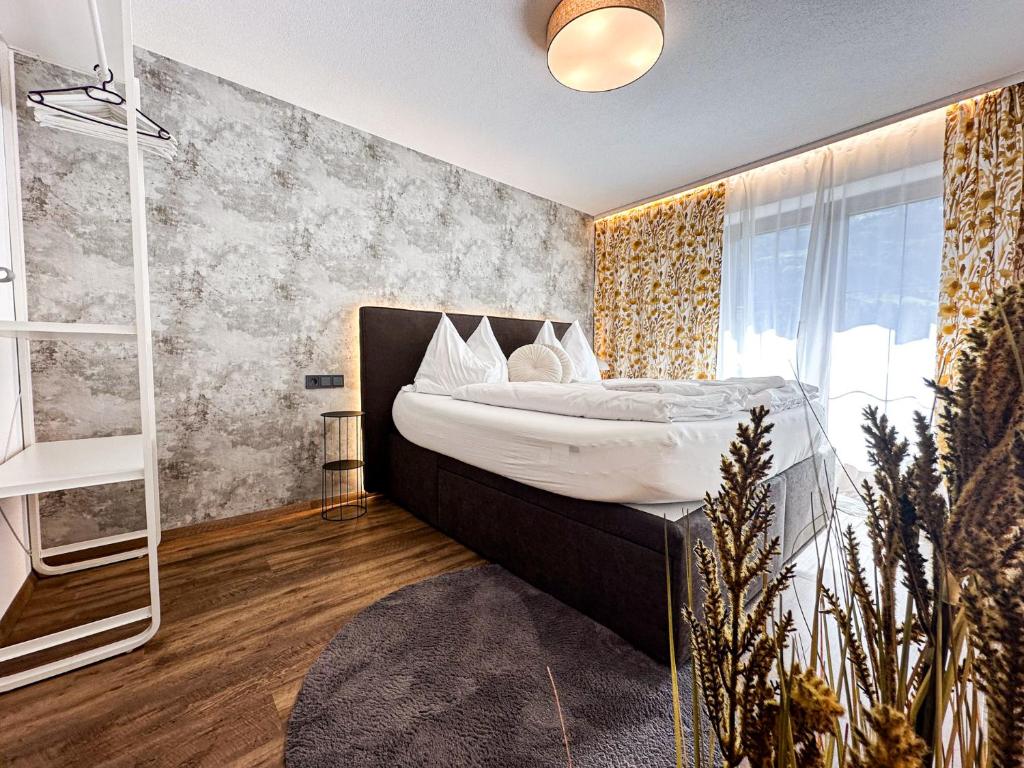 Postel nebo postele na pokoji v ubytování Zillertal Center Apartment Villa