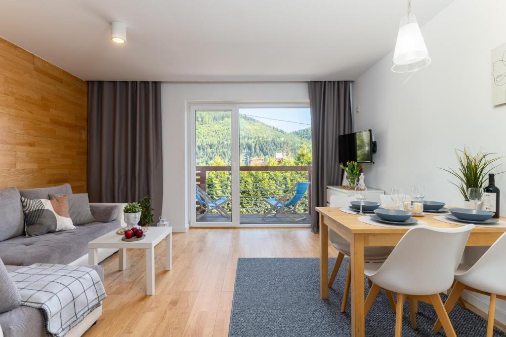 Posedenie v ubytovaní Apartamenty Orla