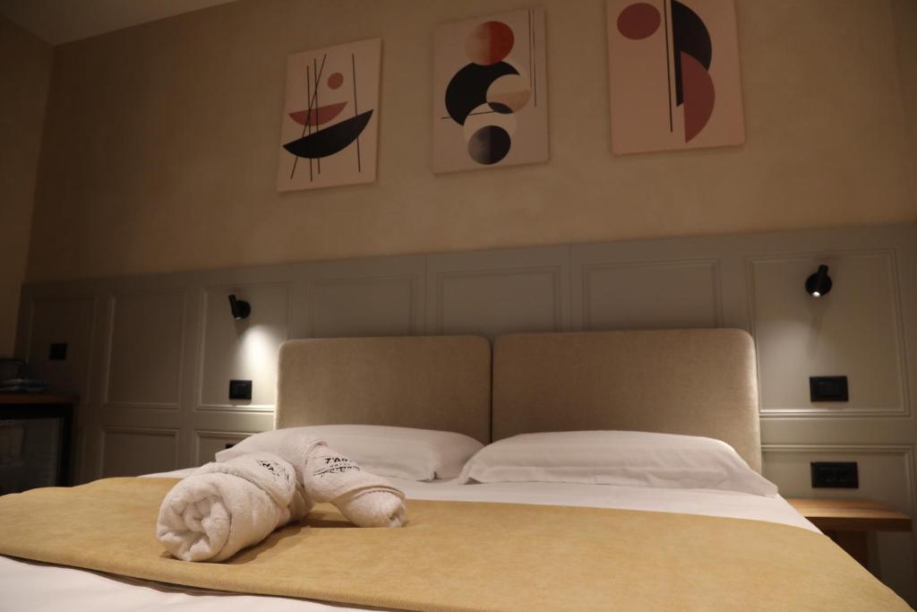Postel nebo postele na pokoji v ubytování Z art Hotel