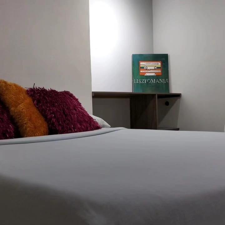 Postel nebo postele na pokoji v ubytování ZIVÁ HOSTAL