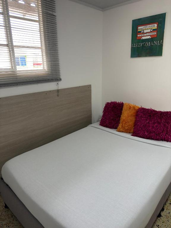 Postel nebo postele na pokoji v ubytování ZIVÁ HOSTAL