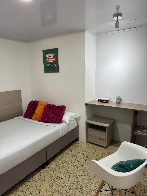 Postel nebo postele na pokoji v ubytování ZIVÁ HOSTAL
