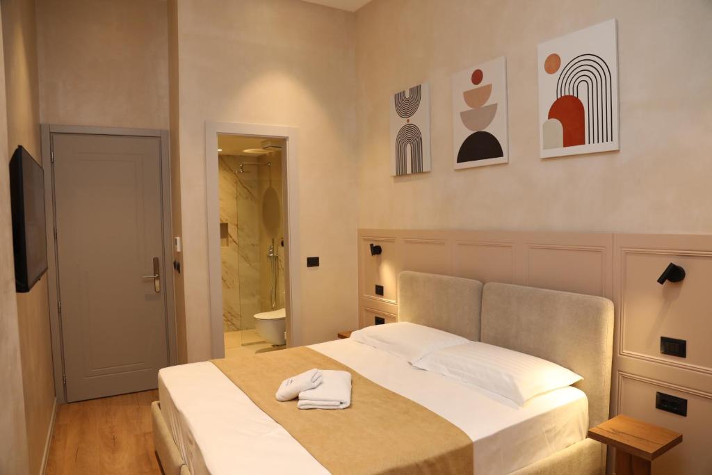 Postel nebo postele na pokoji v ubytování Z art Hotel
