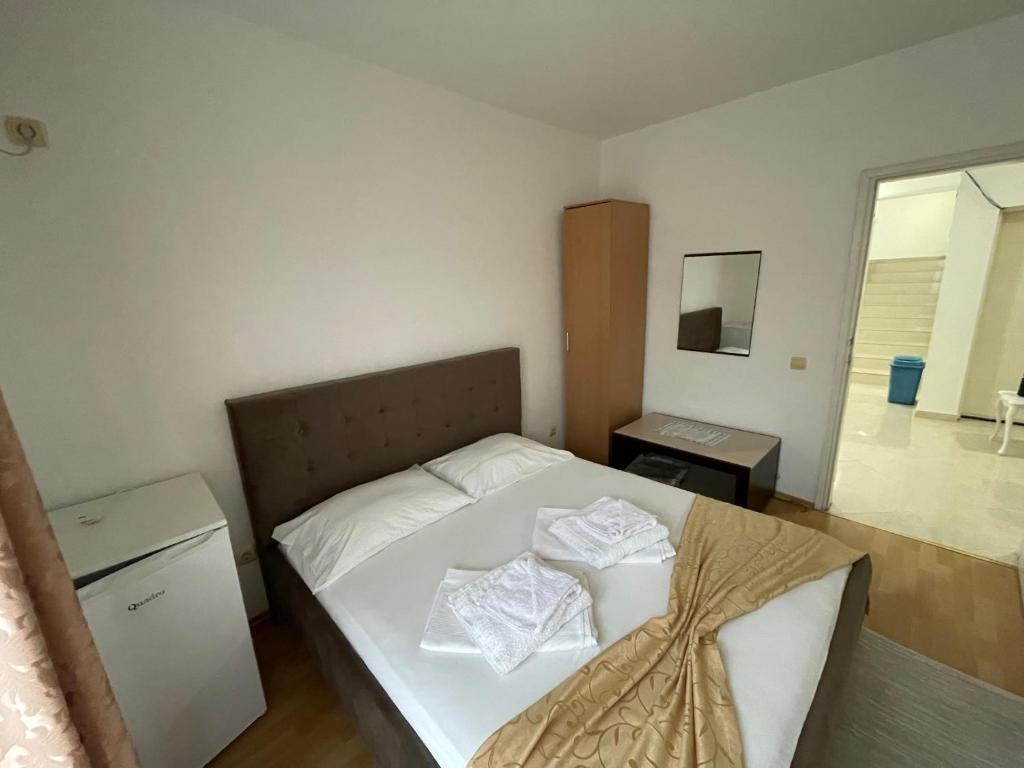 Postel nebo postele na pokoji v ubytování Molla Apartments