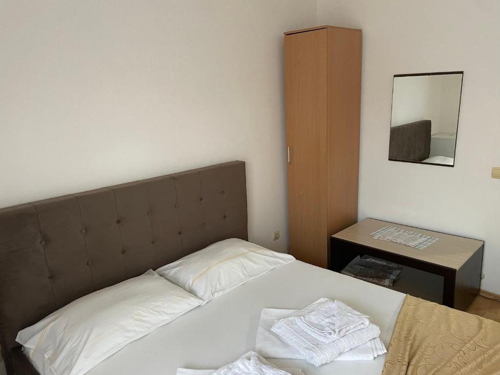 Postel nebo postele na pokoji v ubytování Molla Apartments