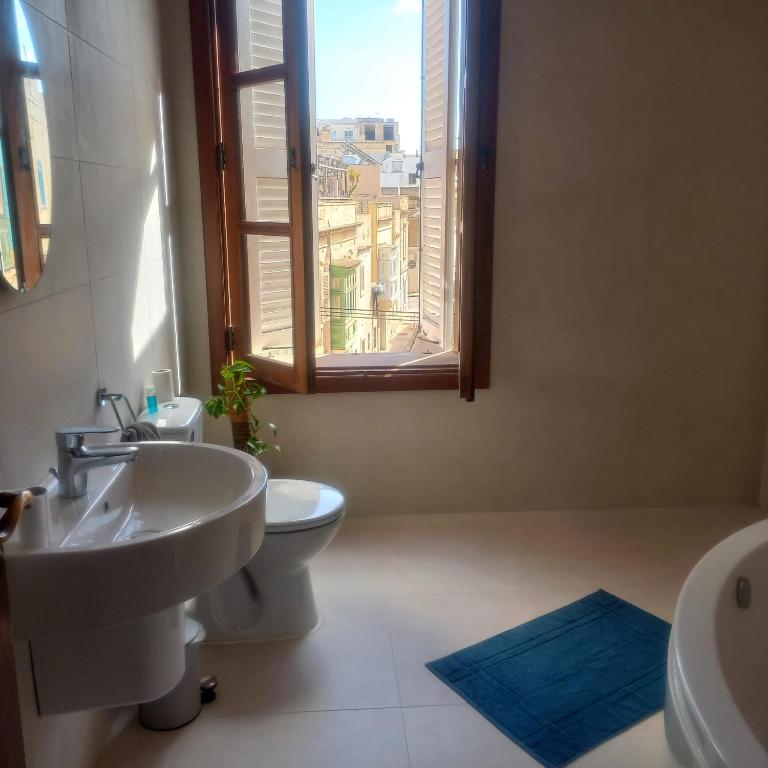 Koupelna v ubytování Casa Nina Sliema Urban Residences