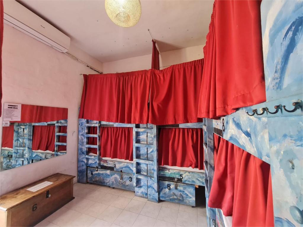 Postel nebo postele na pokoji v ubytování Hostel Malti Budget
