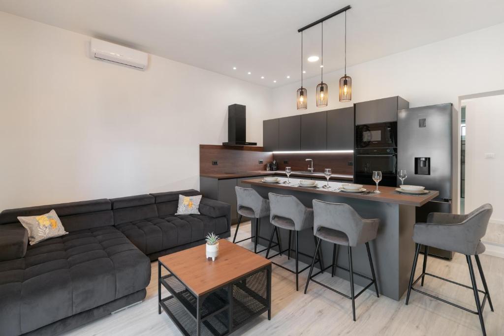 Η κουζίνα ή μικρή κουζίνα στο Apartments Angelo