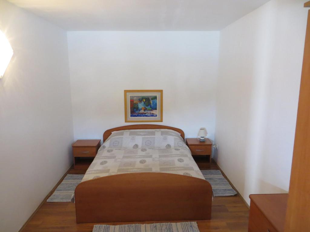 Posteľ alebo postele v izbe v ubytovaní Apartments Makjanić