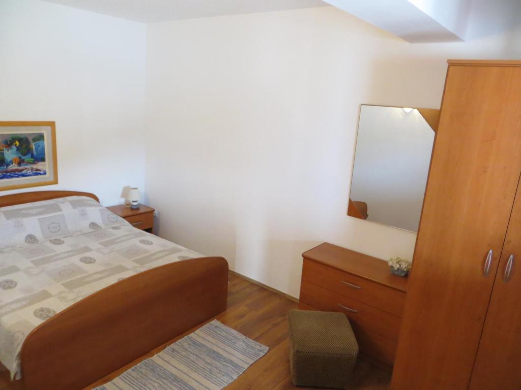 Posteľ alebo postele v izbe v ubytovaní Apartments Makjanić