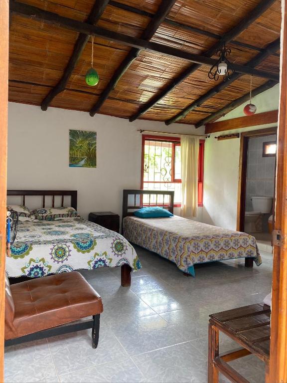 Postel nebo postele na pokoji v ubytování Finca hotel tierra grata