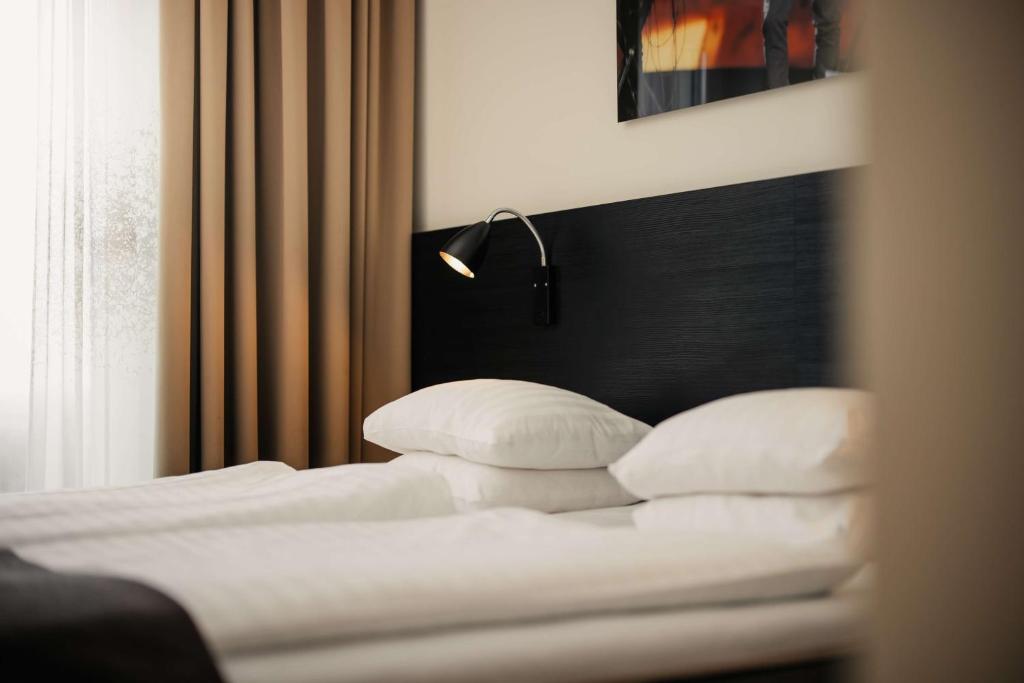 Postel nebo postele na pokoji v ubytování Best Western Malmo Arena Hotel