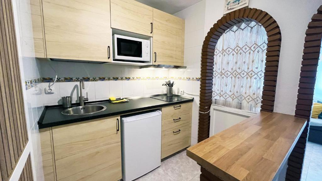 Kuchnia lub aneks kuchenny w obiekcie Mshome Encanto Mediterráneo