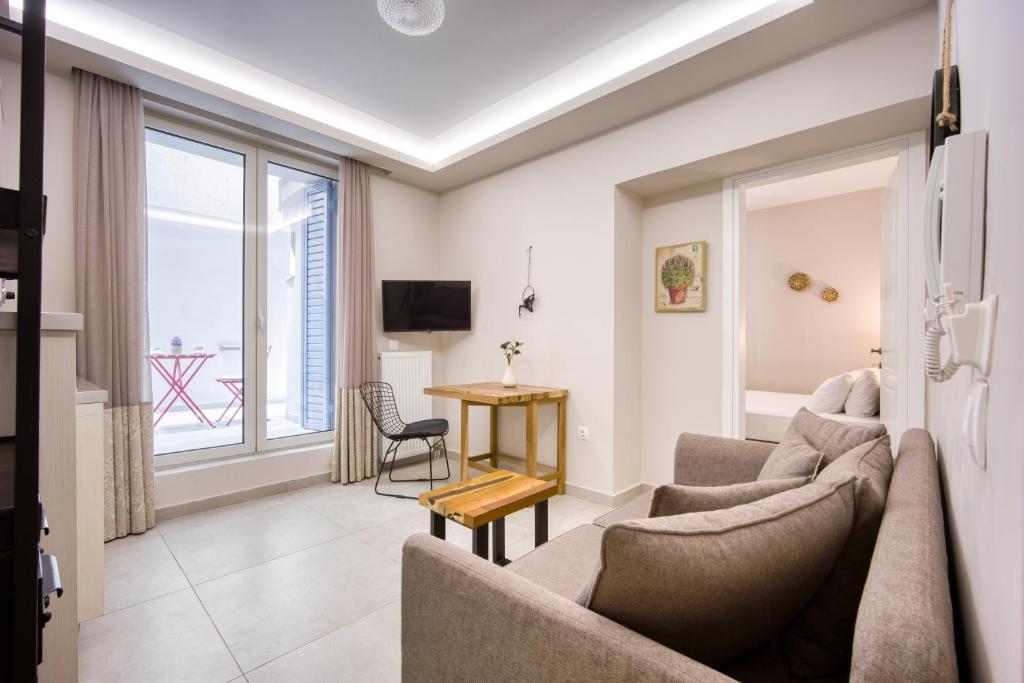 Telewizja i/lub zestaw kina domowego w obiekcie Pagrati/Hilton area, Bentzi (3) Boutique Apt. for 4